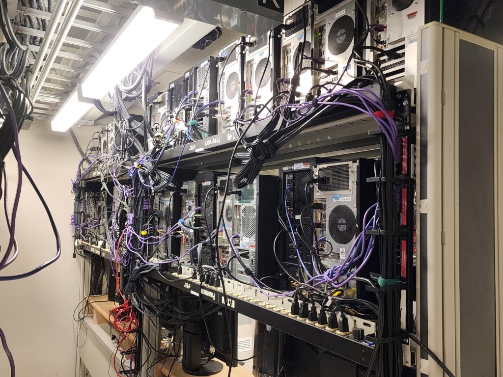 Dense Dell server cluster with a tangle of power and network cables and Eaton power distribution units